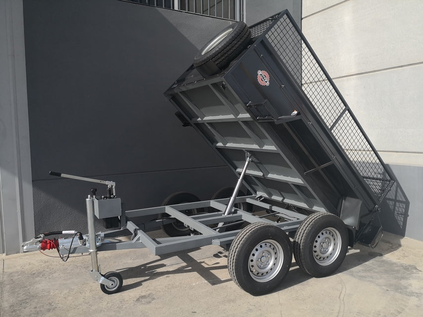 Remolque basculante hidráulico 2 ejes de 1.350 kg + ruedas 185 r14c